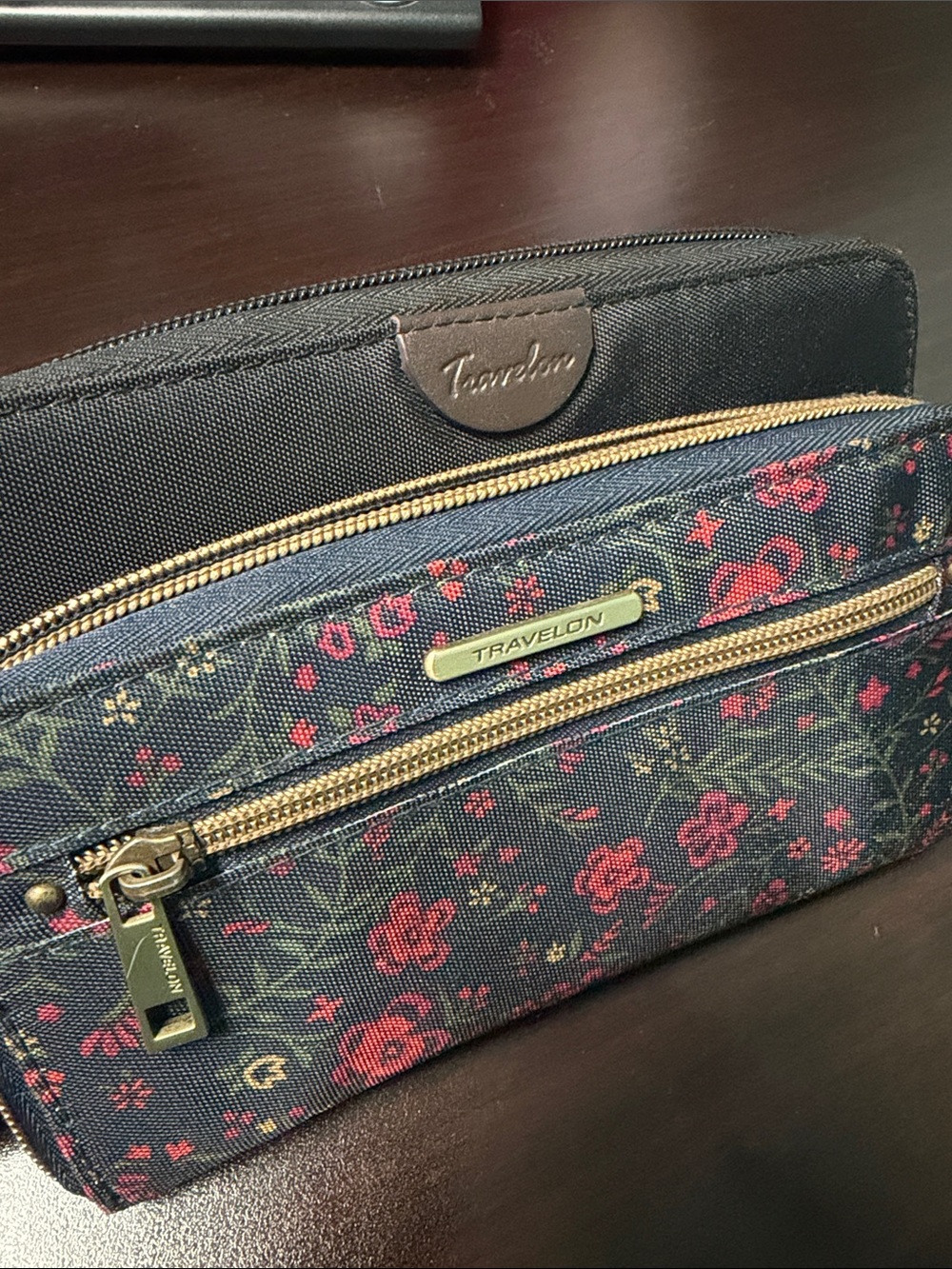 2 Travelon wristlet wallets , 8x4 zip around Floral &  black , detachable keyrng